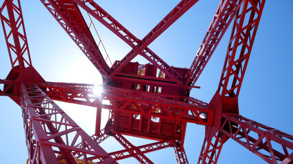 low angle view of red steel crane