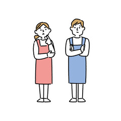 腕組みをし考えているエプロン姿の男女