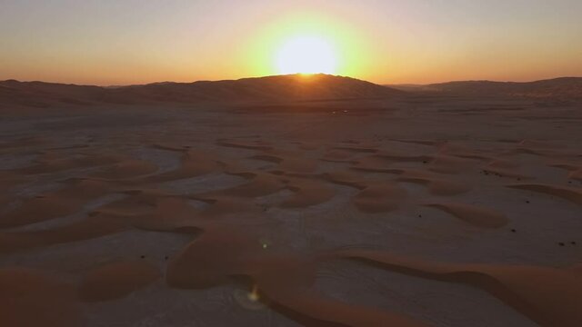 Liwa oasis middle east Moreeb dune sunset desert landscape rising aerial view