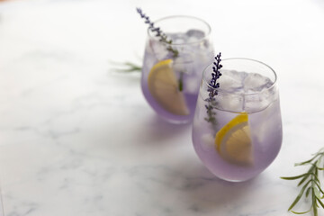 Purple lavender refreshing ice tea with lemon