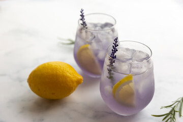 Purple lavender refreshing ice tea with lemon