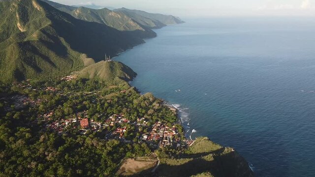 Aerial shot of Puerto Colombia, Aragua State, Venezuela, high angle circle pan
