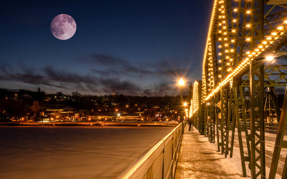Night view of Stillwater from lift bridge under the Moon