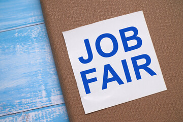 Job fair, text words typography written on paper, life and business motivational inspirational