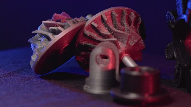 Replacement parts for machine tools in factories, printered on 5D 3D printers. Parts for faFused deposition modeling, 3D printer printing an object from plastic.
