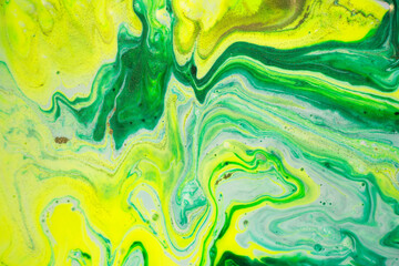 Fototapeta na wymiar Green and yellow marble abstract acrylic background. Marbling artwork texture. Agate ripple pattern. Gold powder.