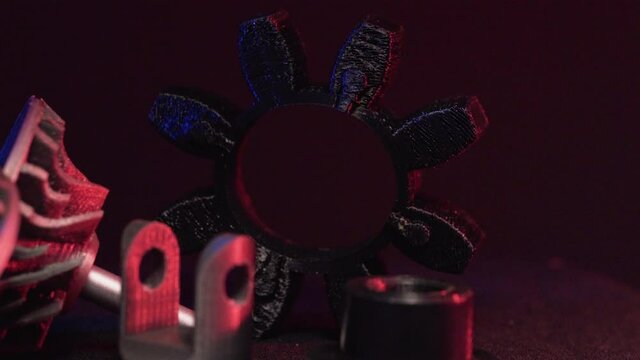 Replacement parts for machine tools in factories, printered on 5D 3D printers. Parts for faFused deposition modeling, 3D printer printing an object from plastic.