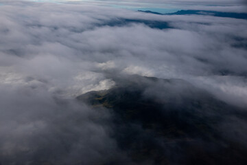 Dawn between fog in mountain ranges of the Colombian Andes