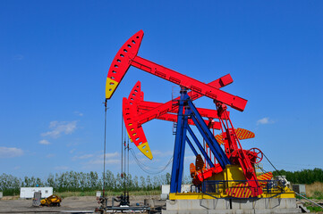 Oil pump working in the outdoor scene