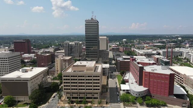 Winston-Salem Downtown Skyline. Aerial View, City Center Buildings on Sunny Day. North Carolina USA. 60fps Drone Shot