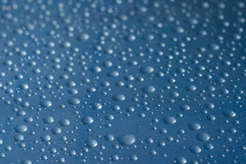 Naklejka na ściany i meble rain drops on blue steel defocused to edges