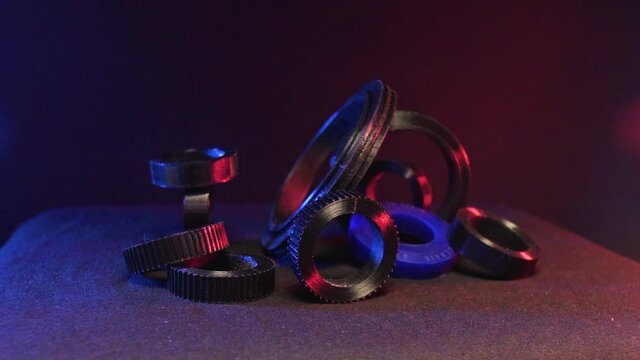 Replacement parts for machine tools in factories, printered on 5D 3D printers. Parts for faFused deposition modeling, 3D printer printing an object from plastic.
