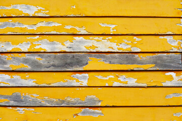 old wood pieces background texture surface and yellow color abrasions