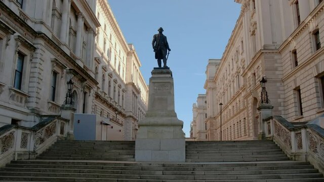Walking towards the statue of Robert Clive in Whitehall, London, UK. Clive was the first British Governor of the Bengal Presidency