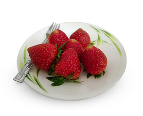 Strawberries in a ceramic plate on white background