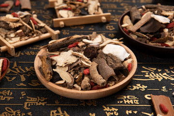 Chinese herbal medicine selection on calligraphy background