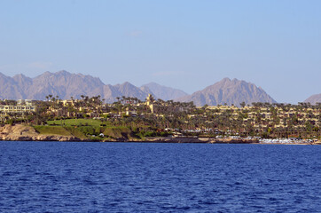 Resorts and hotels at coast of Sharm El Sheikh from yacht. Egypt