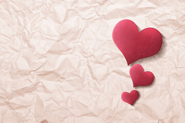 Fototapeta premium Red heart with crumpled paper background
