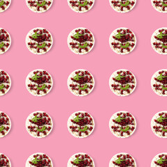 Seamless pattern from galettHealthy breakfast with rice cake and pomegranate on pink flat lay.