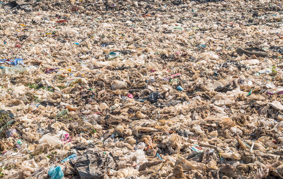 garbage dump pile in trash dump or landfill,truck is dumping the gabage from municipal,garbage dump pile, pollution concept