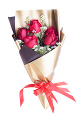 Rose bouquet wrapped in golden paper