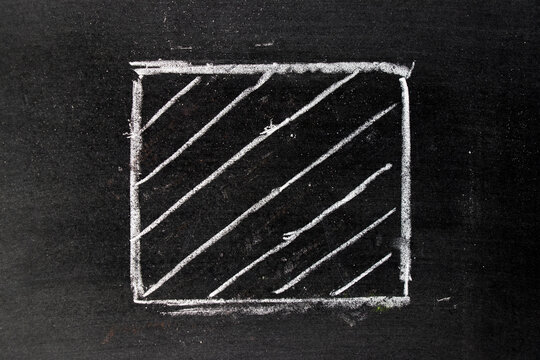 White chalk hand drawing in square with striped line shape on blackboard background