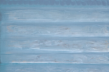 Texture blue boards made of ice. Winter holiday background with Christmas pattern,