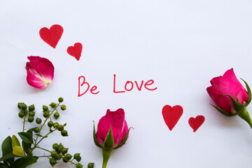 be love message card handwriting with pink rose flowers and draw red heart for special in valentine day arrangement flat lay style on background white