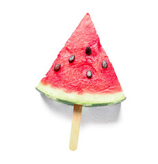 Slice of ripe watermelon with wooden stick on white background