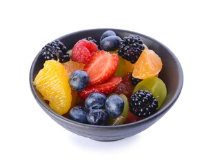 Bowl with fruit salad on white background