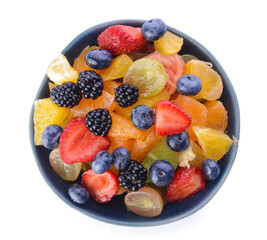 Bowl with fruit salad on white background