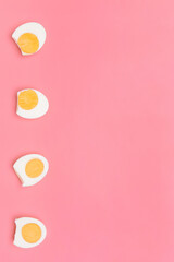 Tasty boiled eggs on color background