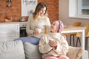 Daughter visiting her mother after chemotherapy at home