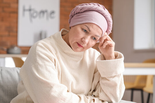 Sad mature woman after chemotherapy at home