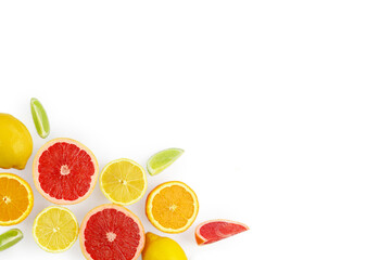 Flat lay composition with citrus fruits, leaves and flowers on white background, copy space.