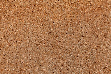 Brown polished sandstone wall texture and seamless background