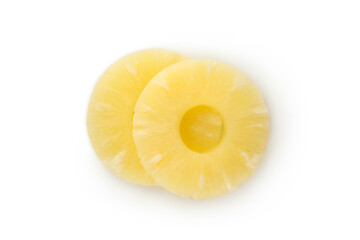 Ripe pineapple slices isolated on white background