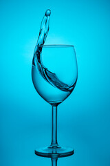 Glass with liquid escaping from it