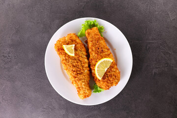 crispy breaded fish and lemon