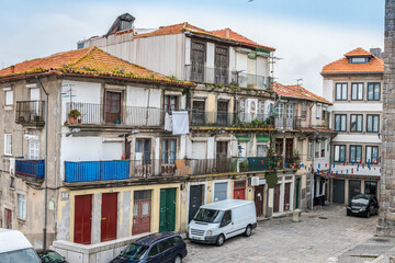A crossroads of streets of Rua De Sebastiao and Dr Pedro Vitorino in Porto, Portugal, as indicated on the plates on the walls