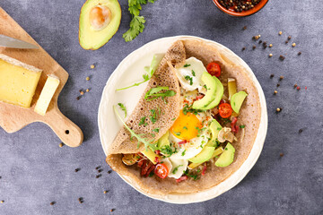 buckwheat crepe with egg, cheese and vegetables