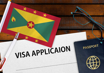 Flag of Grenada, visa application form and passport on table