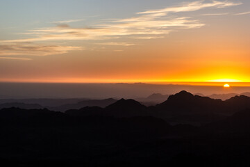 Sunrise at mount sinai summit. Road on which pilgrims climb the mountain of Moses. Egypt, Sinai,...