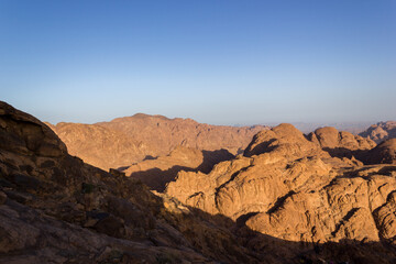 Sunrise at mount sinai summit. Road on which pilgrims climb the mountain of Moses. Egypt, Sinai, Mount Moses