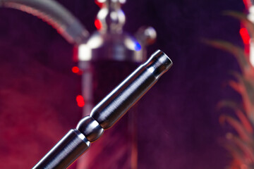 Naklejka premium Mouthpiece of modern hookah on black background