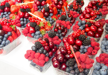 portions of delicious assorted forest fruits
