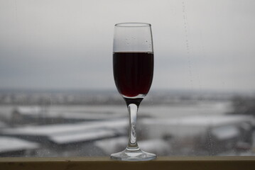A glass of red wine.