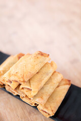 Overlooking a plate of fried spring rolls