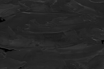Modern contemporary acrylic background. Black texture made with a palette knife. Abstract painting on paper. Mess on the canvas.
