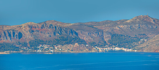 Obraz premium Sea landscape of the town of Meis and boats - Meis island , Greece.